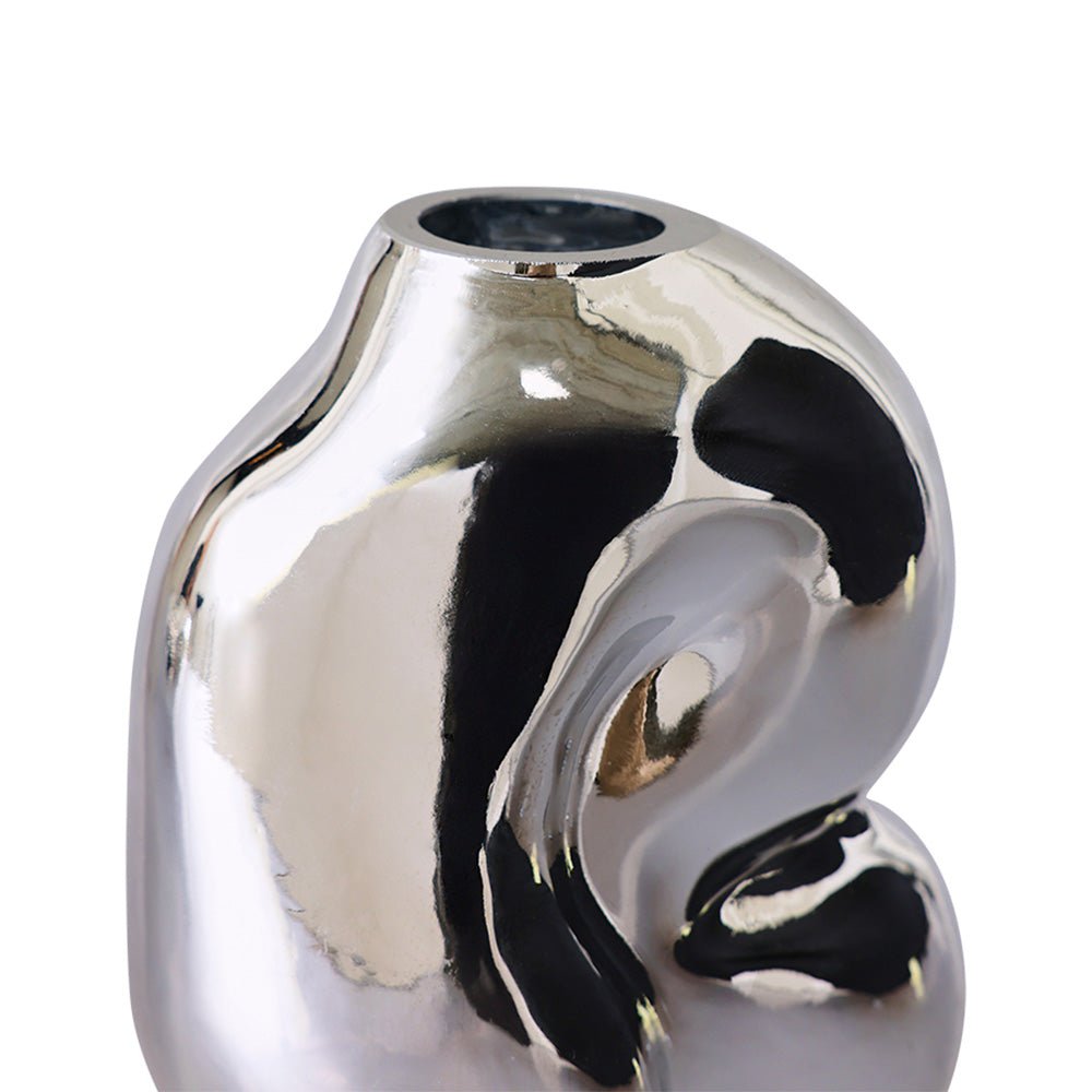 Petit vase en verre brillant chromé