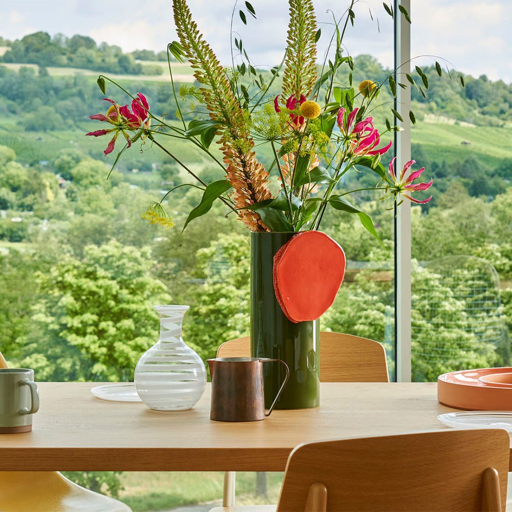 Vase à disque découpé