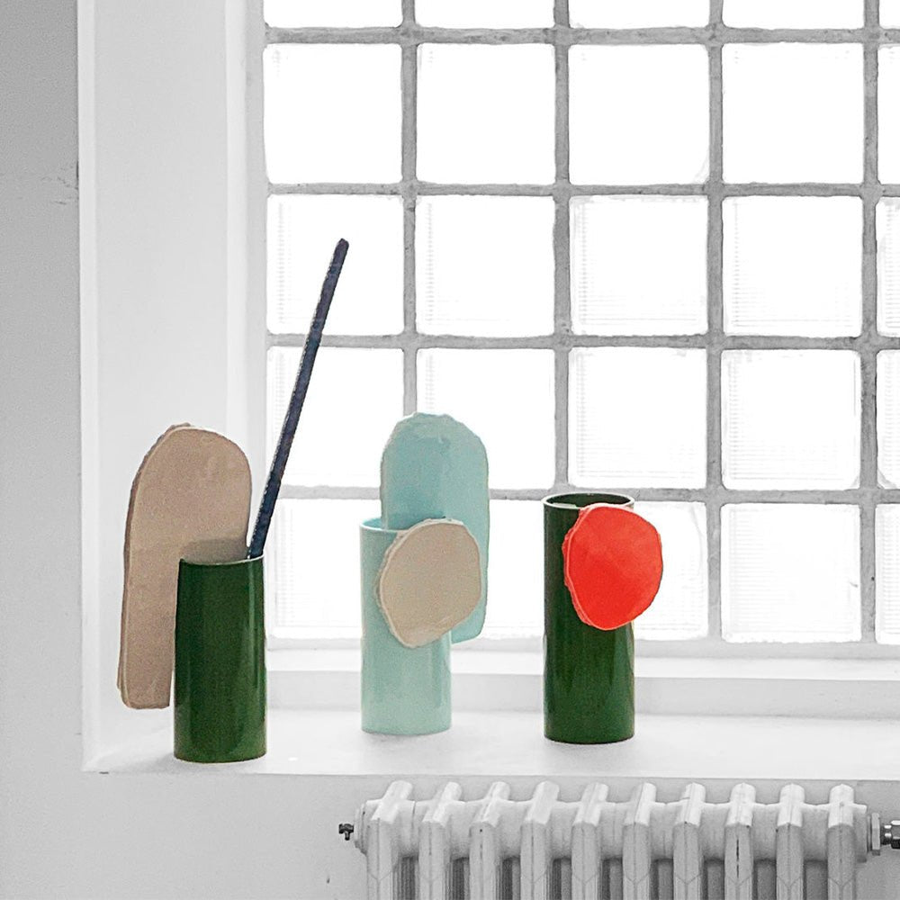 Vase à disque découpé