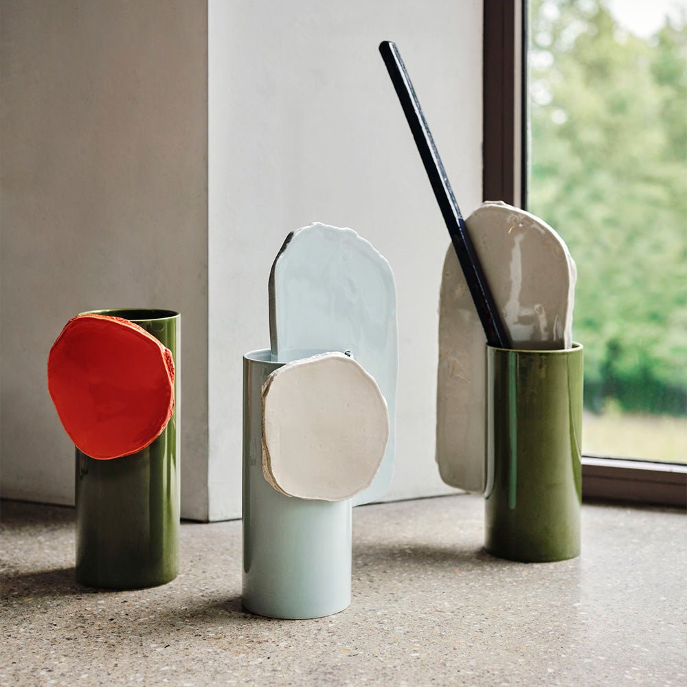 Vase à disque découpé