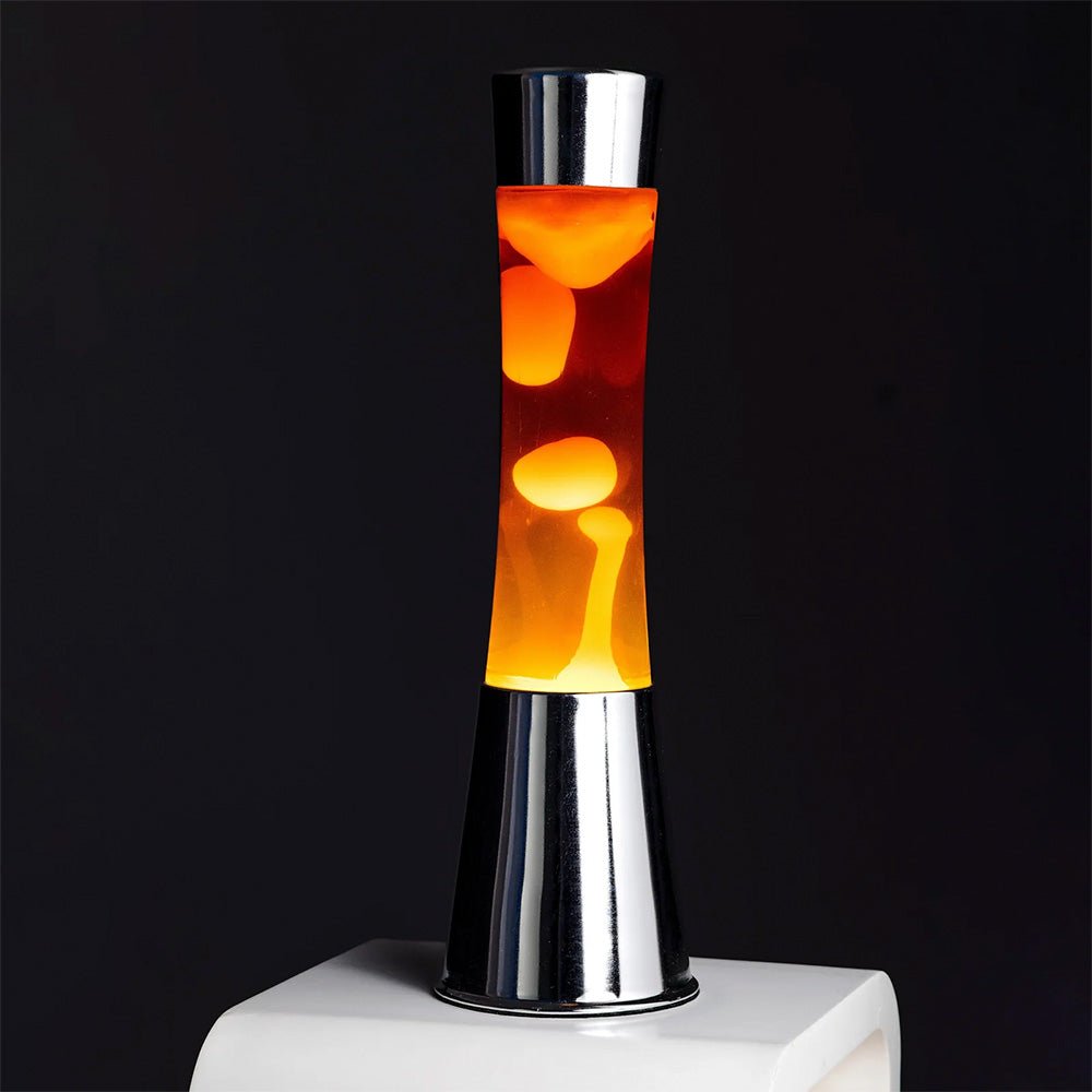 Lampe à lave avec base chromée, liquide transparent et lave orange