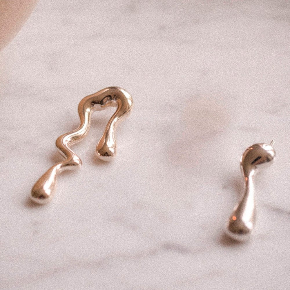 Boucles d'oreilles en argent fondu