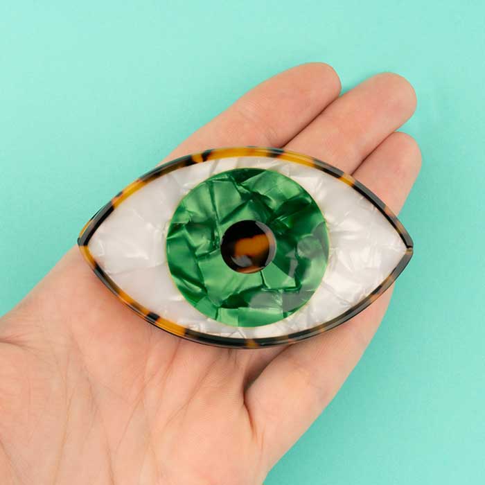 Pinza de Pelo Ojo Verde