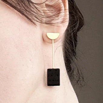 Boucles d'oreilles dépareillées